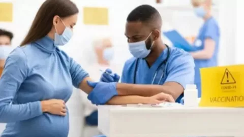 Vaksinasi Covid-19 Untuk Ibu Hamil Ditunda, Kenapa? - GenPI.co