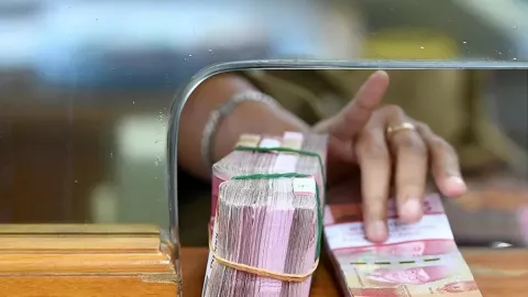 Dolar AS Loyo Seharian, Rupiah Berakhir Menguat ke Rp 14.566 - GenPI.co
