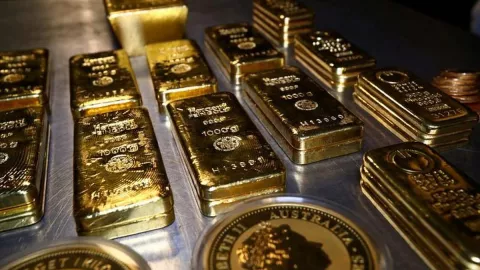 The Fed Masih Kejutkan Pasar, Harga Emas Dunia Turun Makin Dalam - GenPI.co