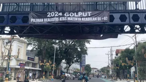 KPU Kota Malang Respons Soal Spanduk Ajakan Golput Pemilu 2024 - GenPI.co