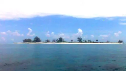 Pesona Nus Eden, Menikmati Sunrise dan Sunset Bersama Penyu - GenPI.co