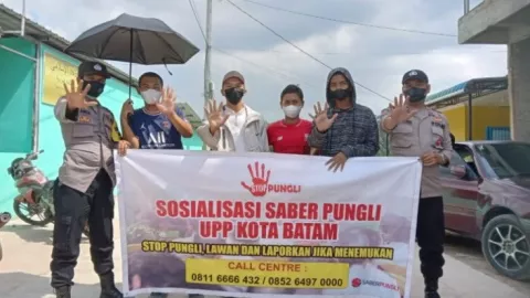 Sapu Bersih! Stop dan Laporkan Pungli, Simak Caranya - GenPI.co KEPRI