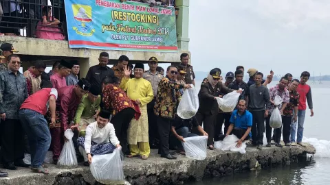 Ribuan Bibit Semah Dilepas di Danau Kerinci - GenPI.co