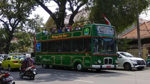 Wisatawan Keliling Kota Malang Gratis Naik Bus Macito - GenPI.co