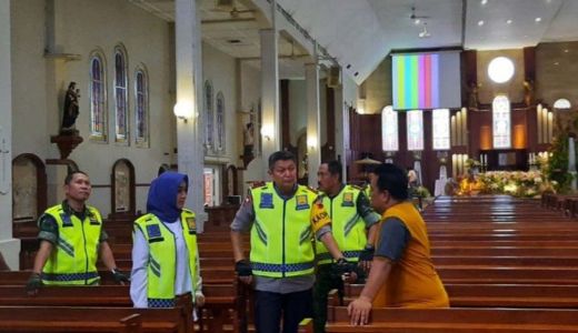 Polresta Pekanbaru Tempatkan Personel di Seluruh Gereja saat Natal - GenPI.co RIAU