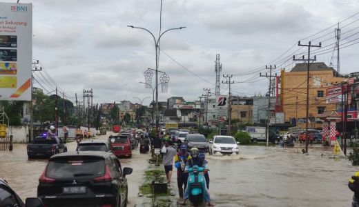 Atasi Banjir, Pemkot Palembang Turunkan Tim Reaksi Cepat - GenPI.co SUMSEL