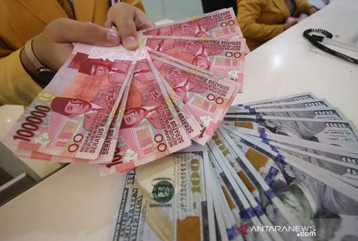 BI Tahan Suku Bunga, Kurs Rupiah Ditutup Menguat ke Rp 14.302 - GenPI.co