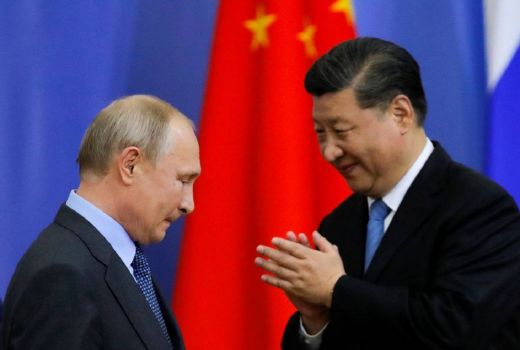 Vladimir Putin Mengakhiri Kunjungan ke China dengan Menekankan Hubungan Strategis - GenPI.co