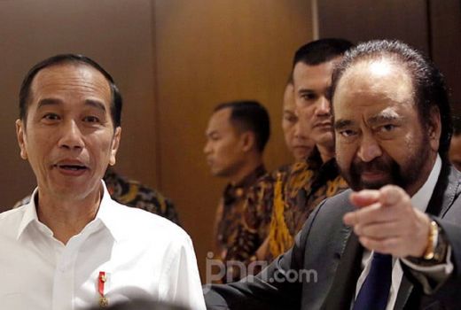 Bahasa Tubuh Jokowi ke Surya Paloh Disorot, Arief Poyuono: Hambar - GenPI.co