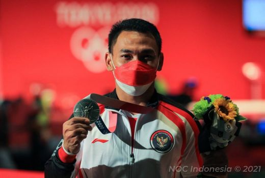 Rebut 1 Tiket ke Olimpiade 2024, Eko Yuli dan Ricko Saputra Habis-habisan - GenPI.co