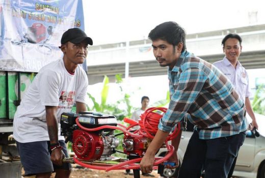 Ringankan Beban Sopir Truk Jaktim, KST Ganjar Lakukan Aksi Mulia - GenPI.co