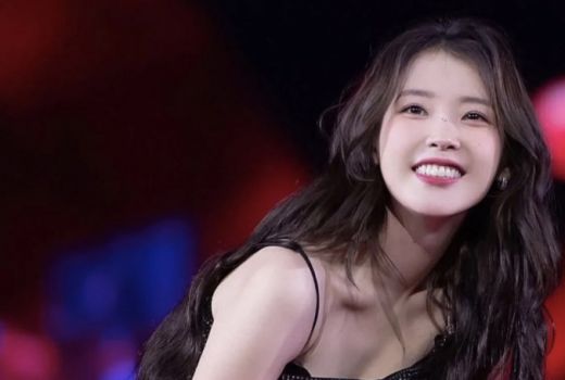 IU Sempat Takut Kolaborasi dengan Musisi Internasional - GenPI.co