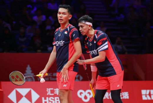 Dikalahkan Tuan Rumah, Fajar/Rian Angkat Koper Lebih Awal di Malaysia Open 2025 - GenPI.co