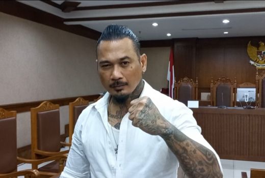 Konflik Memanas, Jerinx Ingin Lihat Adam Deni Pakai Rompi Oranye - GenPI.co