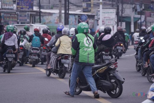 Pengamat Minta Pemerintah Jangan Terjebak Urus Tarif Transportasi Online - GenPI.co