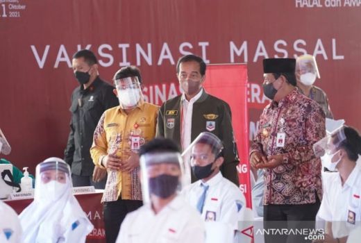 Kata Jokowi, Pandemi Bisa Berakhir Lewat Vaksinasi Massal - GenPI.co BALI