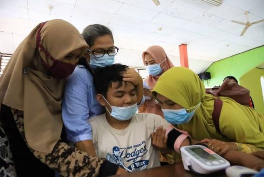 Begini Proses Vaksinasi Anak Berkebutuhan Khusus, Simak! - GenPI.co BANTEN