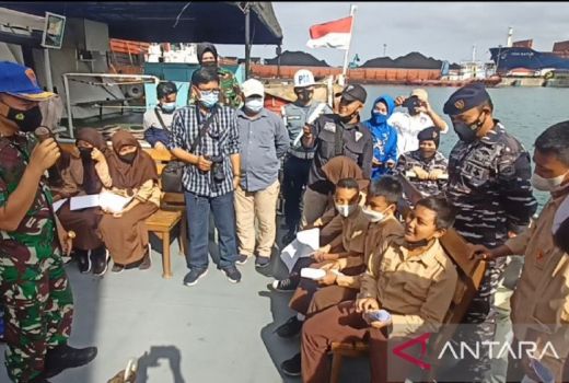 Polisi Militer Banten Gelar Vaksinasi dan Ajak Anak Cinta Bahari - GenPI.co BANTEN