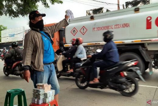 Kenapa Masyarakat Mau Tukar Uang di Pinggir Jalan saat Lebaran? - GenPI.co BANTEN