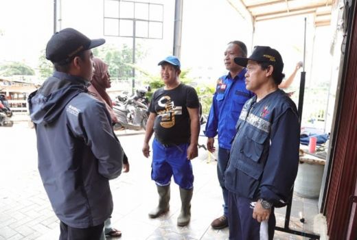 Dinsos Kota Tangerang Bagikan 1.500 Nasi Bungkus untuk Korban Banjir - GenPI.co BANTEN