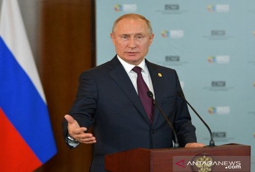 Putin: Pemakzulan Donald Trump Akal-akalan Saja - GenPI.co