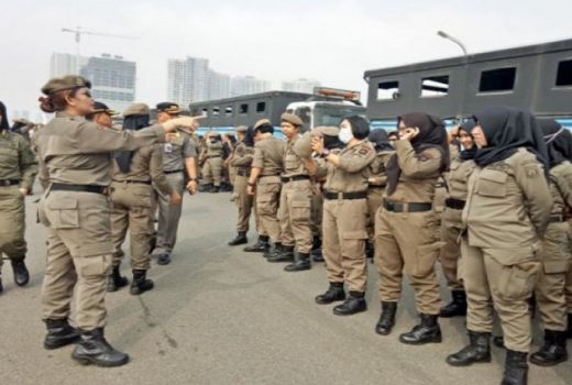 12 Satpol PP Bakal Dipecat Kasus Pembobolan Bank DKI Rp 32 Miliar - GenPI.co