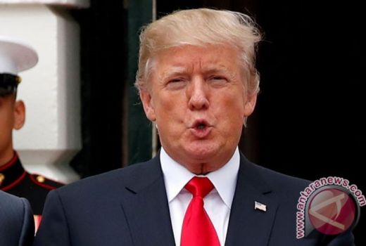 Bukan Perang Dagang, Trump Sebut Perusahaan AS Rugi Karena Malas - GenPI.co