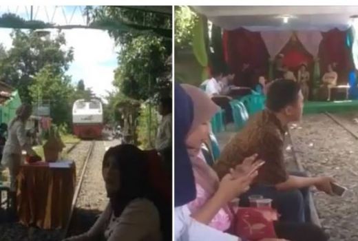 Hajatan Sekaligus Uji Nyali, Pernikahan di Tengah Rel Kereta Api! - GenPI.co