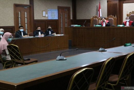 Jaksa Pinangki Pakai Gamis dan Kerudung saat Sidang Tipikor - GenPI.co