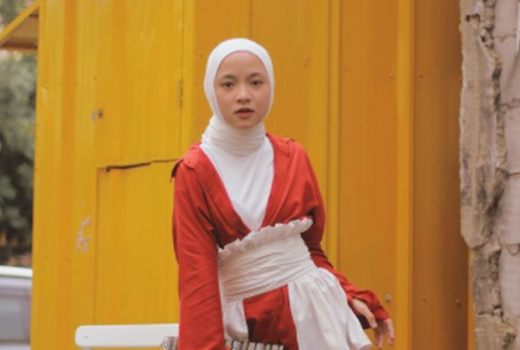 Bukan Soal Selingkuh: Padu Padan OOTD Oranye Nissa Sabyan, Keren! - GenPI.co