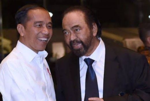 Kata Pengamat, Pelukan Jokowi ke Surya Paloh Maknanya Seperti Ini - GenPI.co