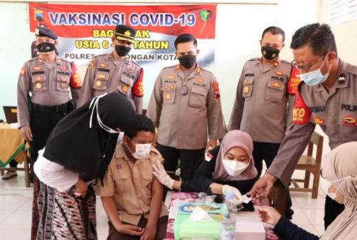 Vaksin Sasar 29.432 Anak di Kota Pekalongan, Polresta Bantu Ini - GenPI.co JATENG