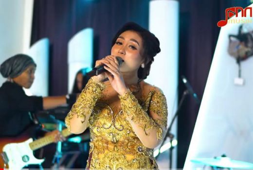 Ani Arlita Luncurkan Lagu di JPNN Musik, Nyanyi Bareng Yuk! - GenPI.co JATIM