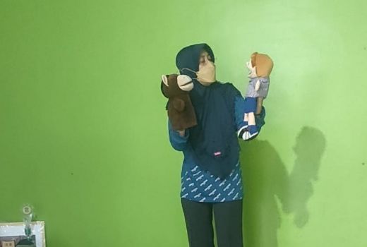Harris Punya Cara Sendiri Hibur Anak Yatim Piatu Korban Covid-19 - GenPI.co JATIM