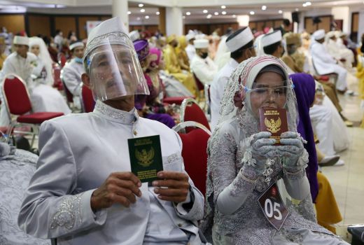 Warga Surabaya Nikah Massal, Jumlahnya Mencengangkan - GenPI.co JATIM