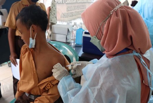 Polres Malang Gelar Vaksinasi Berhadiah Sepeda BMX - GenPI.co JATIM