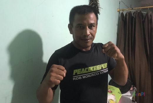 Kisah Pilu Mantan Atlet Tinju Dobrak Arter, Terpaksa Jaga Parkir - GenPI.co JATIM