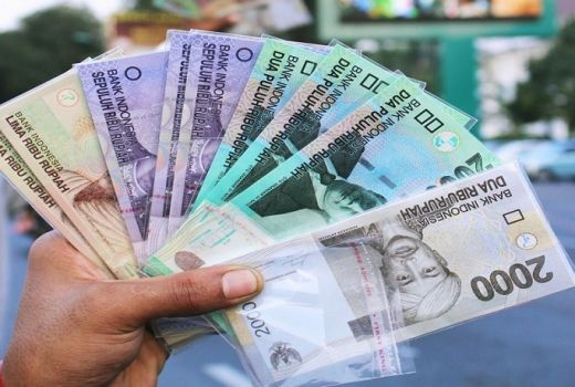 Mau Lebaran Jasa Tukar Uang Receh Marak, Ini Menurut Hukum Islam - GenPI.co