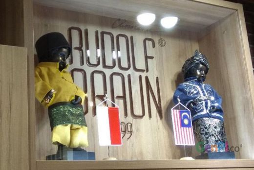 Lucunya Patung Manneken Pis di Brussels Ketika Pakai Baju Adat Palembang - GenPI.co