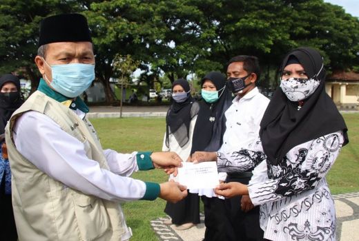 Baznas Lombok Utara Bantu Ratusan Guru dan Honorer - GenPI.co NTB