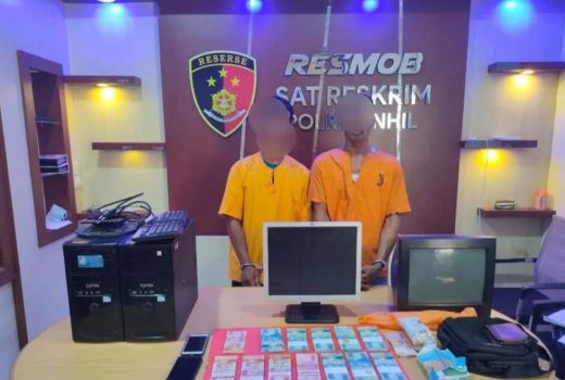 Edarkan Uang Palsu Rp 10 Juta, 2 Pria di Inhil Dibekuk Polisi - GenPI.co RIAU