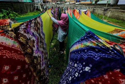 Kampung Tuan Kentang, Wisata Belanja Kain Tradisional Palembang - GenPI.co SUMSEL