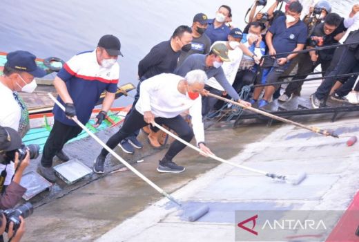 Ratusan Petugas Dinas PUPR Palembang Bantu Gotong Royong Warga - GenPI.co SUMSEL