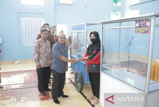 Hamdalah, Pelaku UMKM OKU Diberi Bantuan Payung Hingga Etalase - GenPI.co SUMSEL