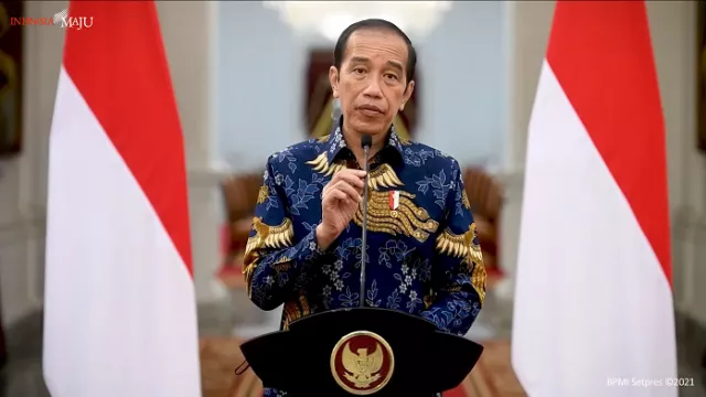 Jokowi Berikan Tanda Kehormatan Bagi Nakes Gugur Selama Pandemi - GenPI.co