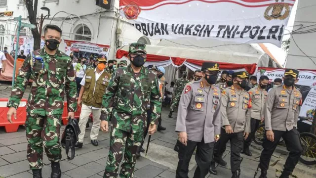 Konflik TNI-Polri Meruncing, Andika dan Listyo Disorot Tajam - GenPI.co