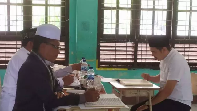 238 Bacaleg Pidie Gagal Tes Baca Al-Quran dalam Tahapan Pemilu 2024 - GenPI.co