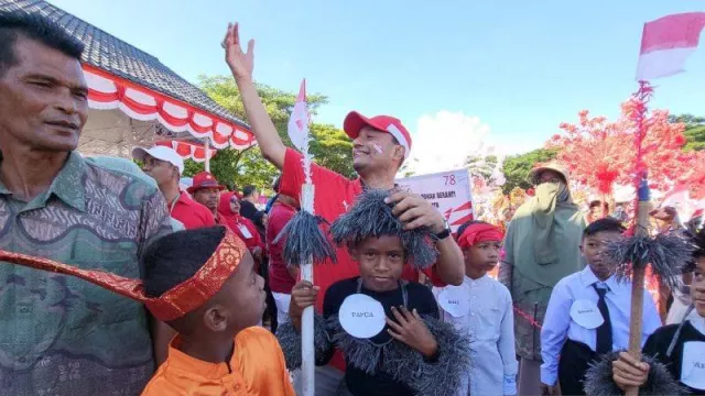 Rayakan HUT ke-78 RI, 8.436 Warga Aceh Meriahkan Karnaval Pesona Budaya Nusantara - GenPI.co