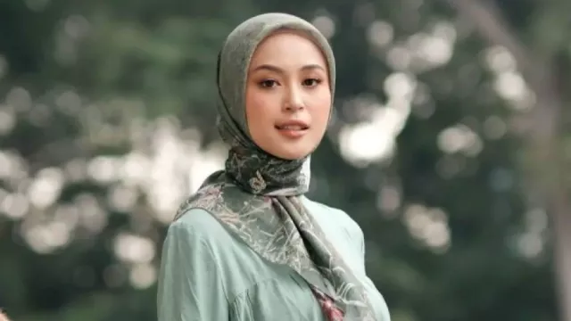 Tips Pakai Baju Muslimah saat Panas Agar Cantik dan Tidak Gerah - GenPI.co