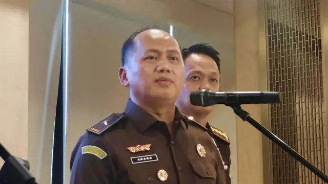Jurist Tan Mangkir dari Panggilan Kejagung, Kabur ke Singapura? - GenPI.co